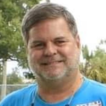 Headshot of smiling male.