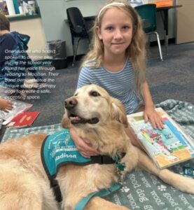 AKC Gazette article about GRRMF Hearts of Gold Therapy Team, a girl sitting with a Hearts of Gold Therapy dog.